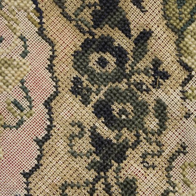 detalj på broderi i grönt
