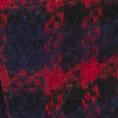 detaljbild på tyget i rött, blått och svart